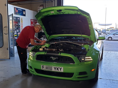 Ford Mustang undergoing a special inspection at a partner workshop in Alicante region Ford Mustang at workshop
